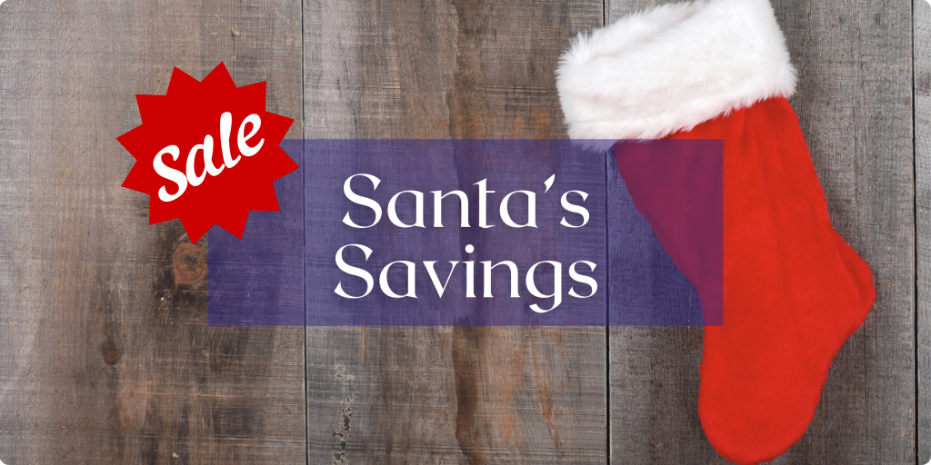 A red stocking with white fur trim hangs on a barnboard wall. Text: Sale! Santa's Savings.