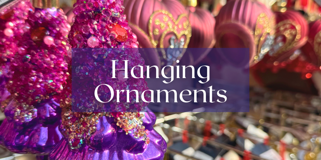 glittering purple and pink holiday tree ornaments at TERRA Greenhouses